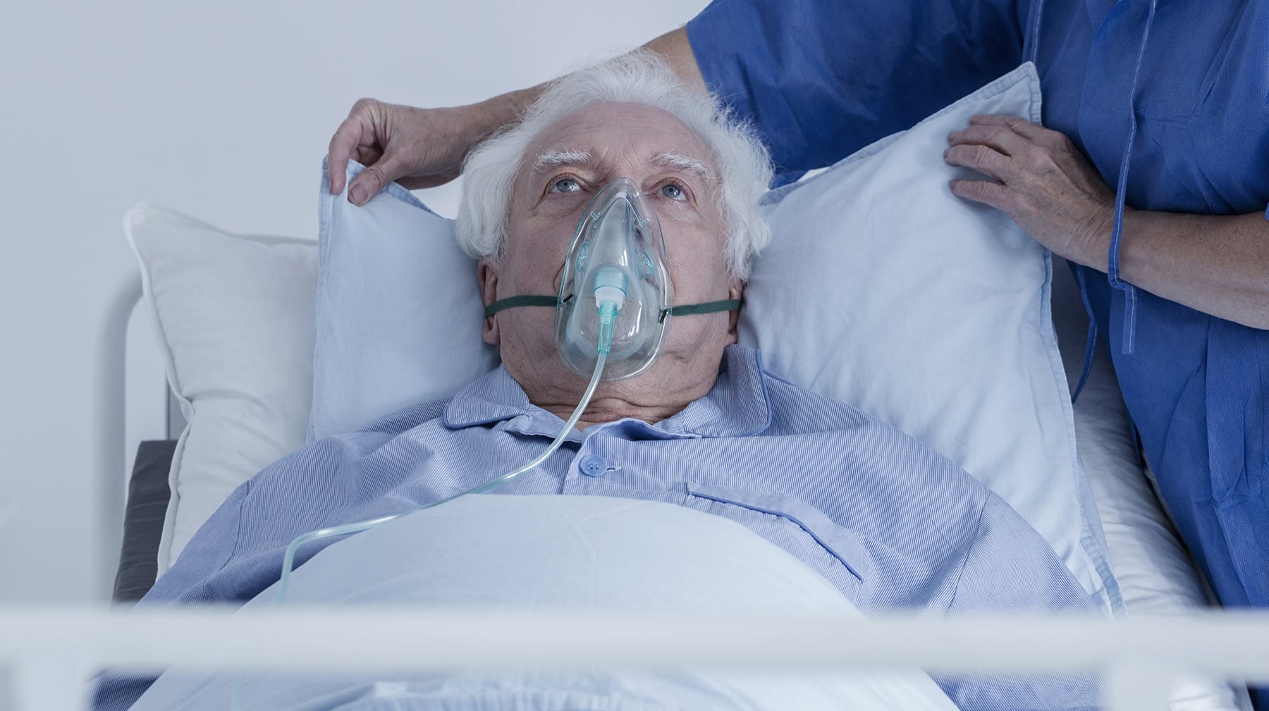 Senior man with oxygen mask