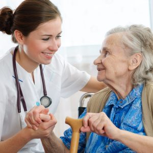 Senior woman is visited by her doctor