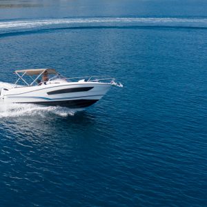 Aerial view of speed motor boat on open sea