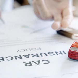 Car insurance policy with red car