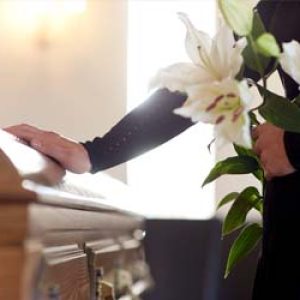 casket with flowers Florida Wrongful Death Law Explained
